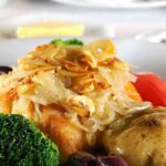 Bacalhau com Batatas e Alho Confitado: Perfeição na Simplicidade